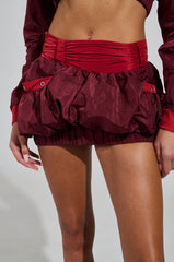 PUTTING IN WORK MINI BUBBLE SKIRT IN RED