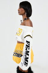 RACING THROUGH OFF THE SHOULDER SWEATSHIRT