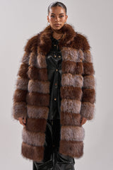 LITTLE BIT OF SPICE PANELED FAUX FUR COAT