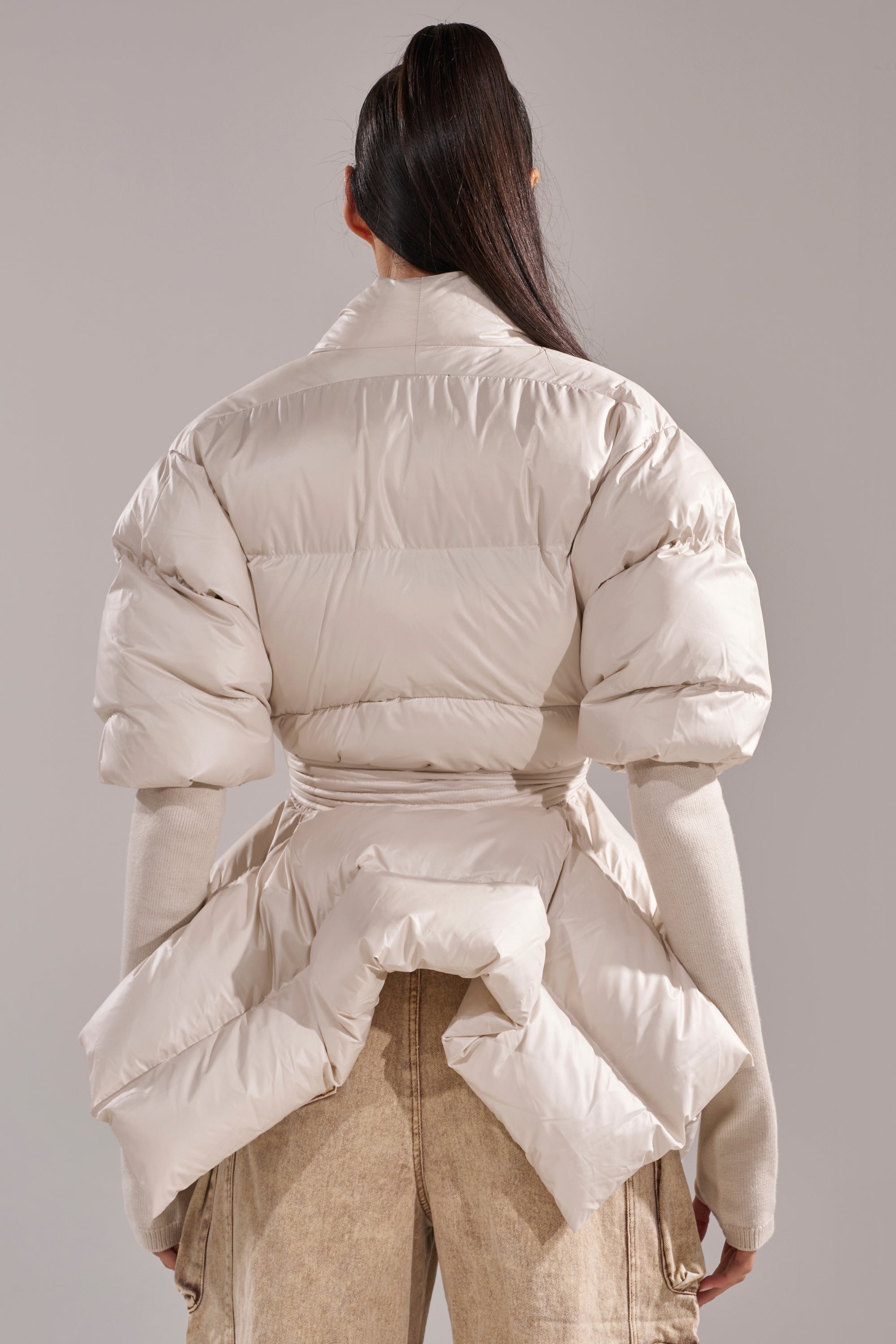 RIB SLEEVE PEPLUM PUFFER IN IVORY