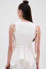 PEPLUM FRONT ZIP SLEEVELESS BLOUSE IN WHITE