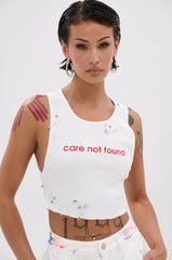 NEVER CARED DISTRESSED CROPPED TANK TOP
