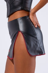 BACK IT UP MINI SKIRT