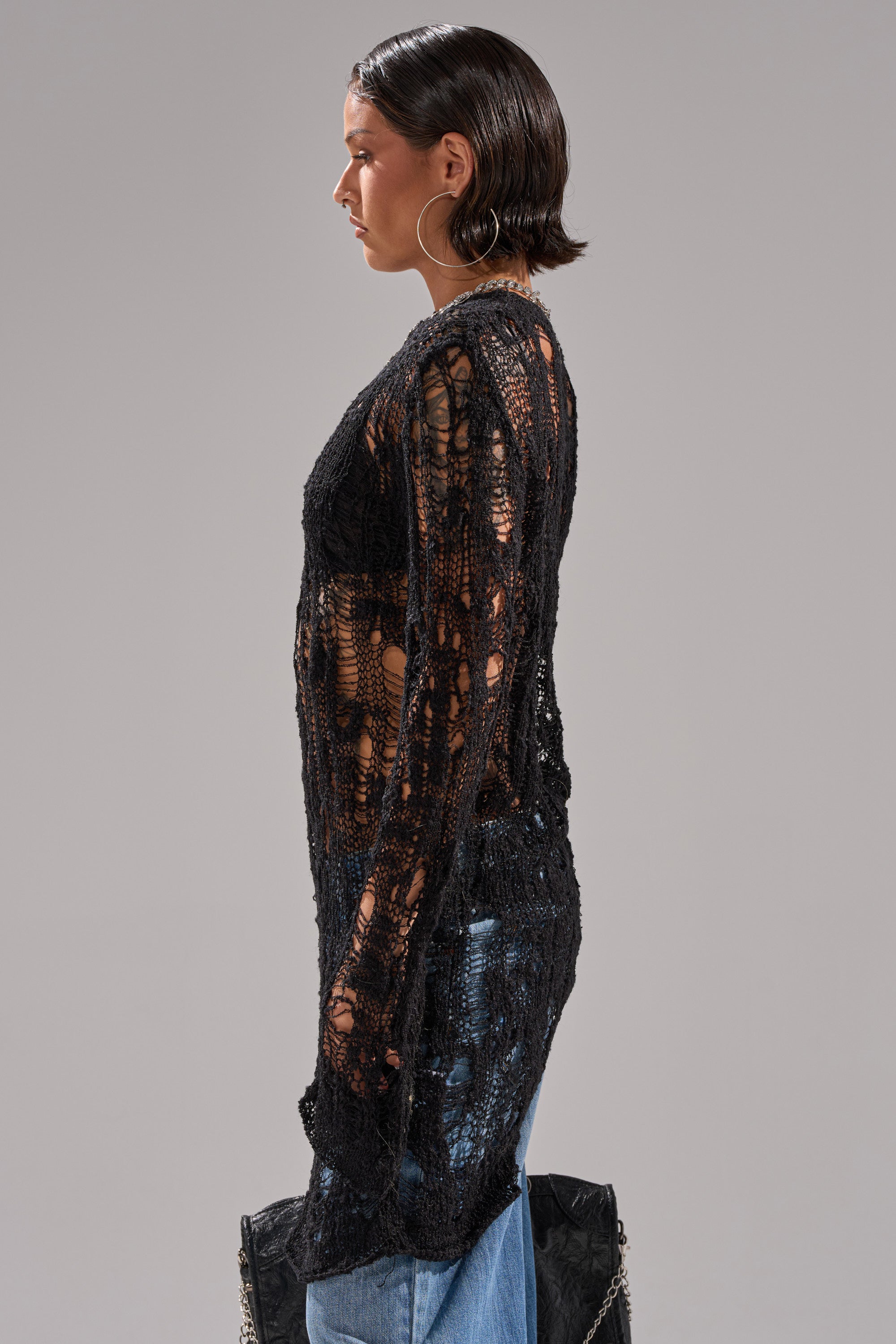 ASYMMETRICAL KNIT SWEATER