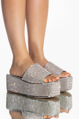 AND ANOTHER ONE SLIP ON FLATFORM SANDAL