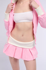 CALL ME BABY PLEATED MINI SKIRT IN PINK