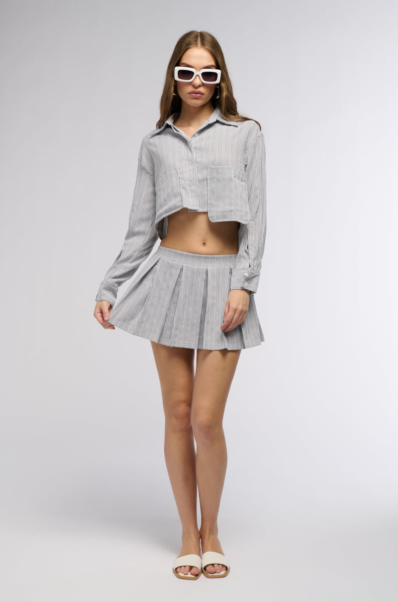 LEAVE IT BETTER PLEATED MINI SKIRT